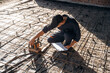 © standret - Checking if the level is right. Builder is working on construction site, unfinished building