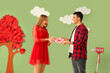 © Pixel-Shot - Young couple with greeting card near decorated green wall. Valentine's Day celebration