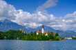 © Westend61 - Blejski Otok church on Lake Bled island with mountain background Slovenia