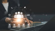 © The KonG - Digital icons of team, profile data, and management analytics float laptop, representing human resource management, employee performance tracking, and business leadership solutions.