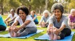 © Eve - Diverse group of active senior women doing seated yoga stretching on mats in park. Healthy lifestyle, wellness, and fitness for retired people. African American and Caucasian women.