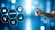© ruzina - A hand pointing to a training icon on a blue background with hexagons