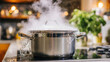 © Smejanka - A pot of boiling water overflowing on a kitchen stove