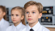 © Watercolor_Kawaii - Schoolchildren classroom education learning boy girl uniform attentive focused blue eyes young indoors minimal style close up school student children kid childhood elementary primary study