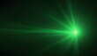 © Monster - Bright green laser beam radiating outwards from a central point against a dark background