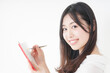 © maroke - メモを取る若い女性