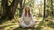 © Nazran - Peaceful young woman meditating in green forest. Yoga lotus pose. Mindfulness concept. Zen wellness relaxation outdoors. Spiritual mental health balance. Calm lifestyle harmony. Nature.