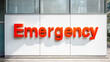 © SHOKO - 壁面に設置された赤く目立つ「Emergency」のサイン