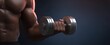 © ckybe - Powerful hand tightly gripping a heavy dumbbell in a vigorous gym strength training session