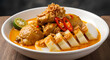 © Nilam Sari - Opor Ayam with Tofu and Egg in Rich Coconut Curry Sauce – Authentic Indonesian Cuisine