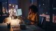 © stockbusters - Stressed architect calling night office working on building project overtime.