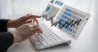 © InfiniteFlow - A professional workspace with hands typing on a keyboard, accompanied by floating data visualizations like graphs and charts, representing modern analytics and insights. Gantry