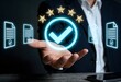 © Pro DG Collections - Businessman holding holographic checkmark symbolizing approval or validation with digital documents