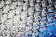 © Myshkovskyi - Abstract background of pixel cubes in blue neon light. 3D rendering illustration.