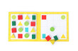 © New Africa - Open book and colorful pieces of geometrical sudoku for children isolated on white, top view
