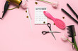 © Pixel-Shot - Calendar with hairdresser's tools and tulips on pink background