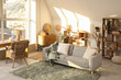 © Pixel-Shot - Interior of stylish living room with grey sofa and workspace near big window