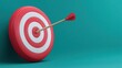 © buraratn - Red and White Circular Target with Arrow Hitting Center on Solid Turquoise Background Reflecting Focus and Accuracy in Achieving Goals and Success Strategies