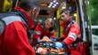 © Laura - Faceless paramedics providing medical care inside ambulance, emergency medical services, mobile healthcare delivery, patient treatment in transit, rescue operations, paramedic