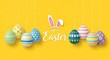 © Helen - Happy Easter text with stylish bunny ears and hanging patterned eggs on yellow background for holiday greeting
