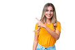 © luismolinero - Young Uruguayan woman over isolated background pointing to the side to present a product