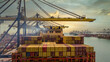 © Kalyakan - Aerial view Container cargo ship loading unloading container import export sea port, Global trade business container cargo ship freight shipping commercial trade logistic transportation international.