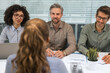 © ty - Job interview process is in office. Human resources, meeting and group of hiring candidates for vacancy.