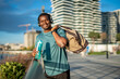 © Jelena - Smiling african man enjoying urban fitness lifestyle
