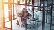 © Hinrichsen/peopleimages.com - Above, planning and tablet with business people in glass office for feedback, research or review. App, coaching and flare with employee group in boardroom at work for development, meeting or update