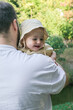 © phpetrunina14 - Father and Baby Enjoying a Day in the Park Portrait