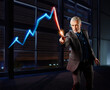 © Westend61 - Businessman painting the stock market development with light