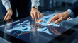 © Shootdiem - Business team collaborates on a smart logistics map, analyzing global routes and supply connections.