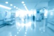 © Iryna - Blurry hospital hallway with bright lights and people