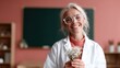 © svastix - A cheerful woman in a lab coat holds a small bouquet of flowers, exemplifying joy and the beauty of life in a warm and inviting setting with a soft background.
