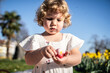 © ADDICTIVE STOCK - Girl enjoying Easter in a sunny garden setting