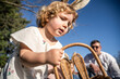 © ADDICTIVE STOCK - Girl enjoying an Easter egg hunt with her family