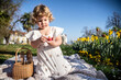 © ADDICTIVE STOCK - Little girl celebrating Easter in a garden