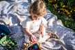 © ADDICTIVE STOCK - Girl celebrating Easter outdoors