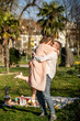 © ADDICTIVE STOCK - Couple celebrating Easter in a joyful embrace outdoors