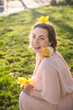 © ADDICTIVE STOCK - Cheerful woman enjoying springtime