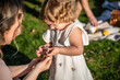 © ADDICTIVE STOCK - Family moments celebrating Easter outdoors