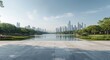 © The 2R Artificiality - Smooth cement floor with copy space overlooking a tranquil lake garden and futuristic city skyline