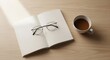 © Auliyan - Cozy Reading Nook - Book, Glasses, and Coffee on Wooden Table.