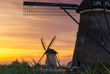 © robertharding - Unesco Windmills of Kinderdijk during sunset, Molenlanden, Alblasserdam, South Holland, Netherlands