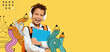 © Prostock-studio - A happy schoolboy with curly hair wears white headphones. He holds a blue folder in one hand and has an orange backpack. The bright yellow background creates a fun learning atmosphere.