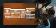 © InfiniteFlow - A group of professionals gathers around a wooden table, analyzing artificial intelligence data via a laptop, showcasing modern technology in a collaborative workspace. Gantry