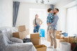 © Serhii - Happy family moving into new home apartment
