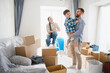 © Serhii - Happy family with son moving into new home