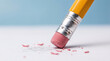 © Ajay - A yellow pencil with a pink eraser is correcting mistakes on a white surface