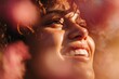 © SUPHANSA - a person s face smiling, with soft light and a blurred background of bright flowers (joy in nature), positive emotion, high resolution, soft focus, ethereal light, 8k,